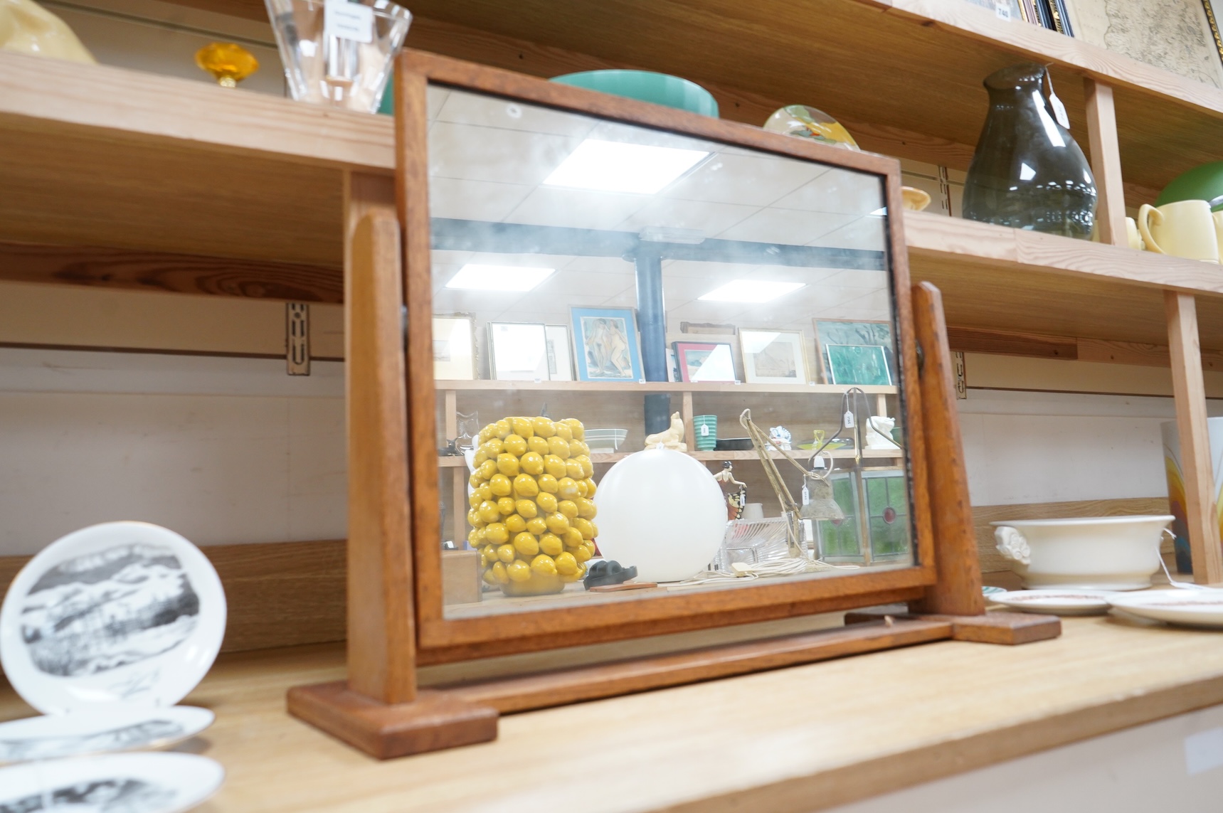 An Art Deco Gordon Russell oak dressing mirror, 66cm wide